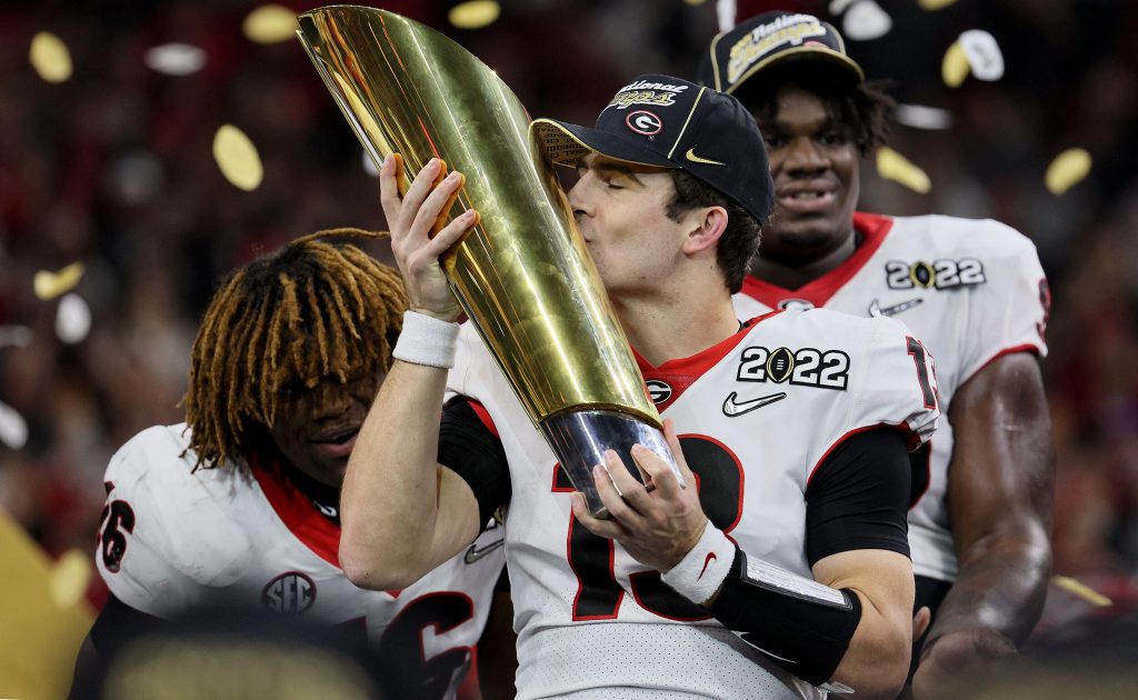 College Football Playoff - The Bulldogs bookend the first round, as 2022  #CFBPlayoff #NationalChampionship Defensive Player of the Game Lewis Cine  heads to the Minnesota Vikings as the 32nd overall pick in