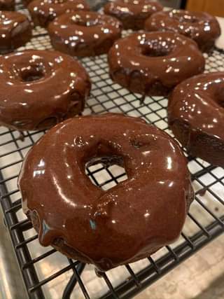 Chocolate Doughnuts on a baking tray featured in Kids Baking Chapionship